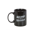 Strange and Unusual Mug